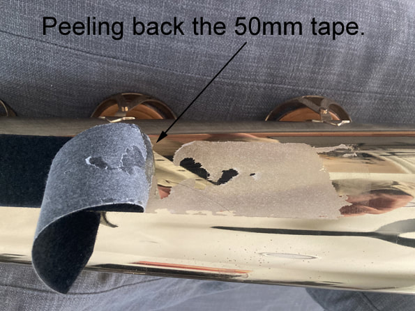 Peeling back 50mm velcro.